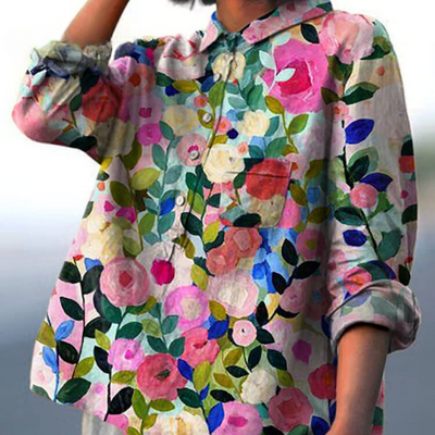 Nina – Elegant Bluse med Blomsterdetaljer